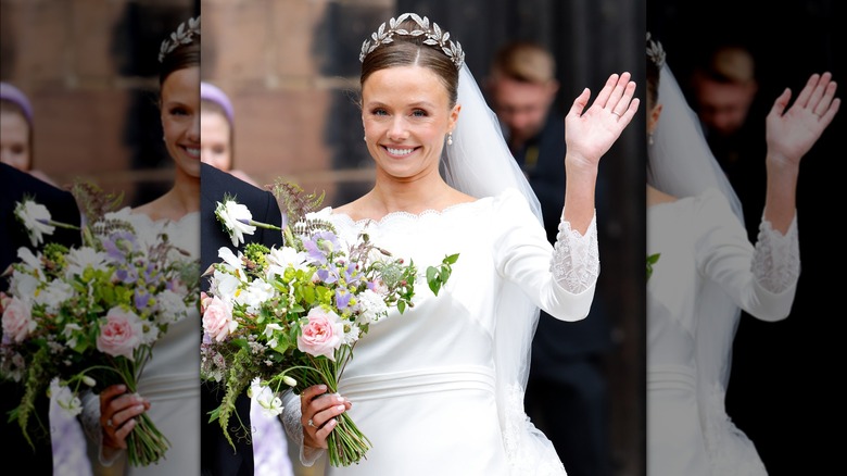 The Duchess of Westminster waves in her wedding dress