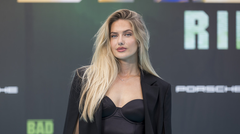 Alica Schmidt in a black top and blazer