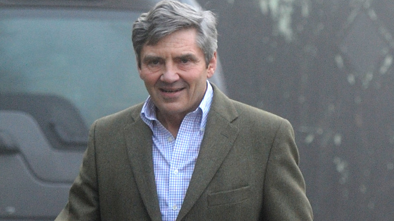 Michael Middleton wearing an olive-colored blazer and blue and white shirt in Berkshire, United Kingdom.