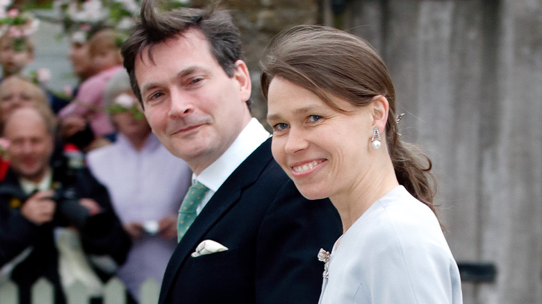 Lady Sarah Chatto and husband smiling at an event