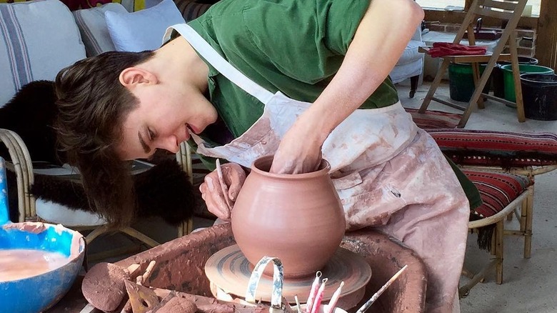 Samuel Chatto at a potter's wheel