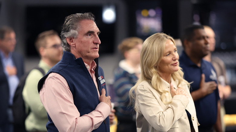 Doug Burgum and wife reciting pledge of allegiance