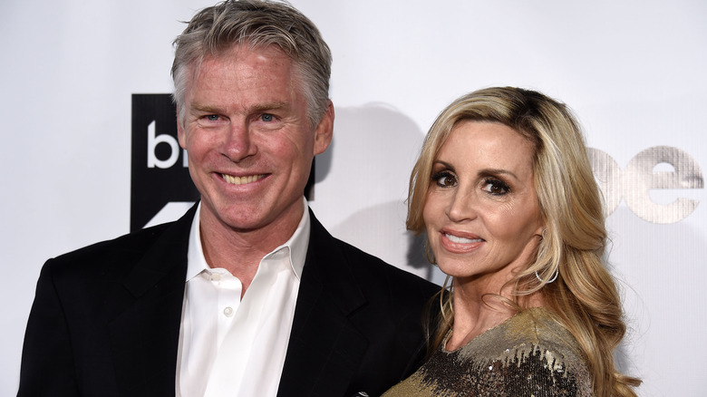 David C. Meyer and Camille Grammer on red carpet