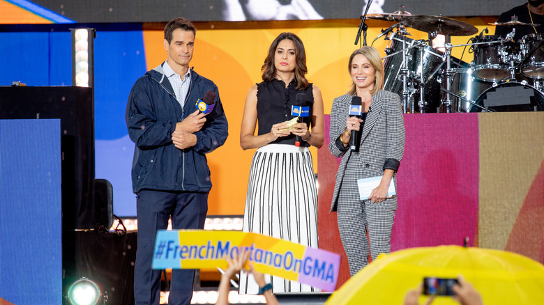 Rob Marciano and GMA co-stars broadcasting at an event 