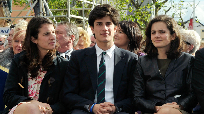 Tatiana, Jack, and Rose Schlossberg sitting