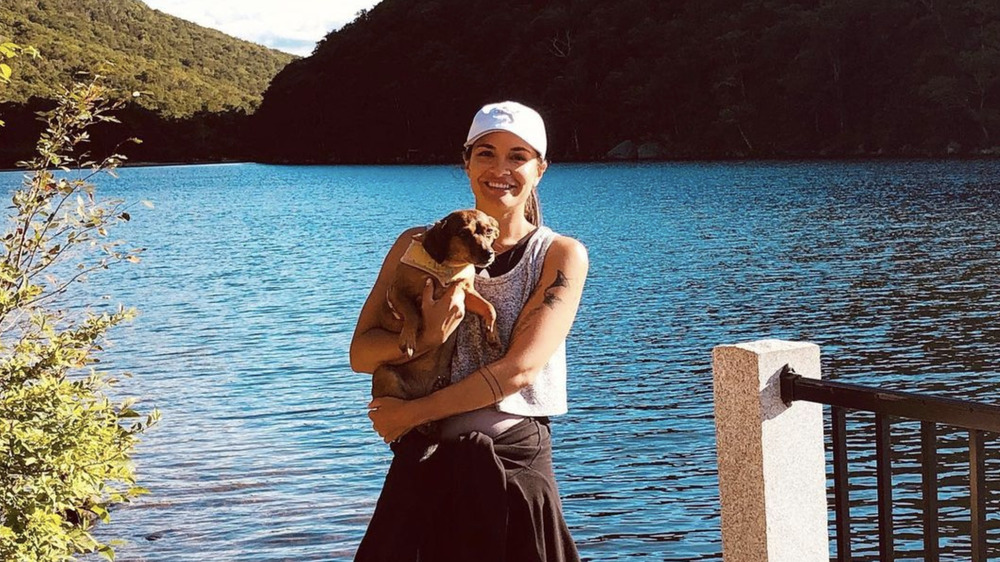 Carolyn Vallejo holding a puppy