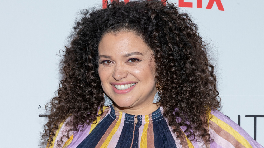 Michelle Buteau posing, smiling