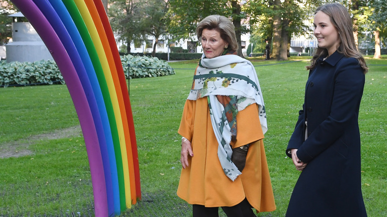 Princess Ingrid and Queen Sonja walking