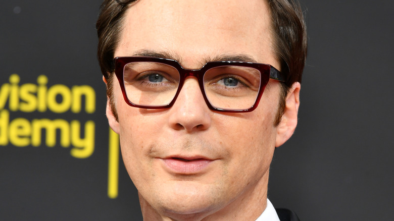 Jim Parsons smiling in glasses