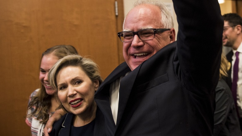 Tim Walz with his arm around Gwen Walz