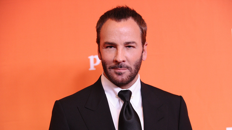 Tom Ford wearing a black suit