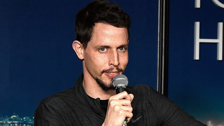 Tony Hinchcliffe speaking into a microphone