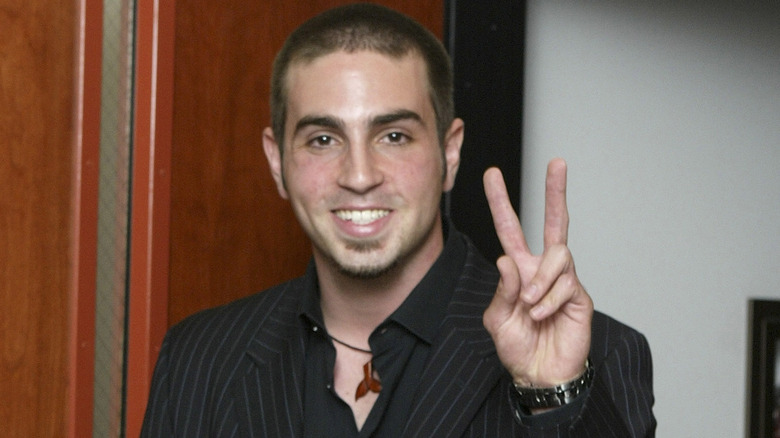 Wade Robson doing a peace sign