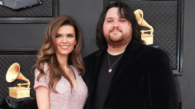 Andraia Allsop and Wolfgang Van Halen posing on the Grammys red carpet