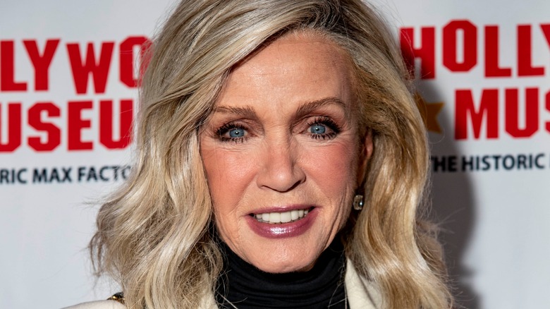 Donna Mills smiling at an event
