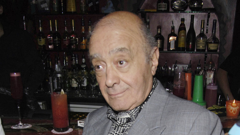 Mohamed Al-Fayed posing