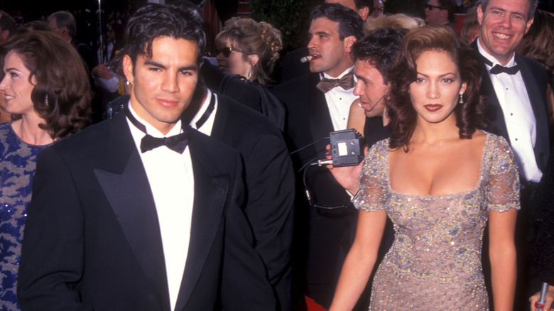 Ojani Noa in tux with Jennifer Lopez in lace dress