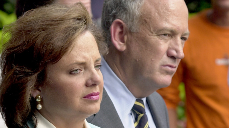 Patsy Ramsey and John Ramsey standing