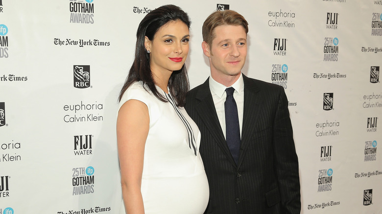 Morena Baccarin and Ben McKenzie posing