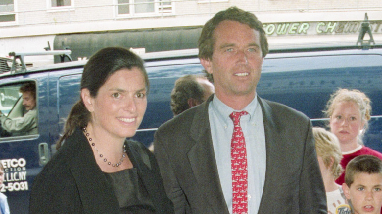 Mary Richardson and RFK Jr. smiling among a group of kids