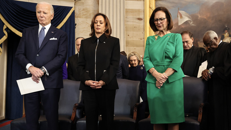 Joe Biden, Kamala Harris, and Deb Fischer standing next to each other