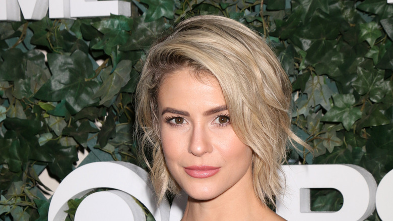 Linsey Godfrey smirking