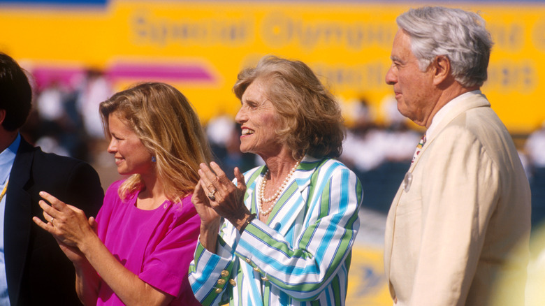 Eunice Kennedy Shriver and Sargent Shriver clapping