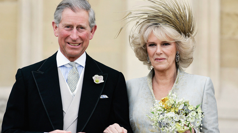 Charles and Camilla smiling at wedding