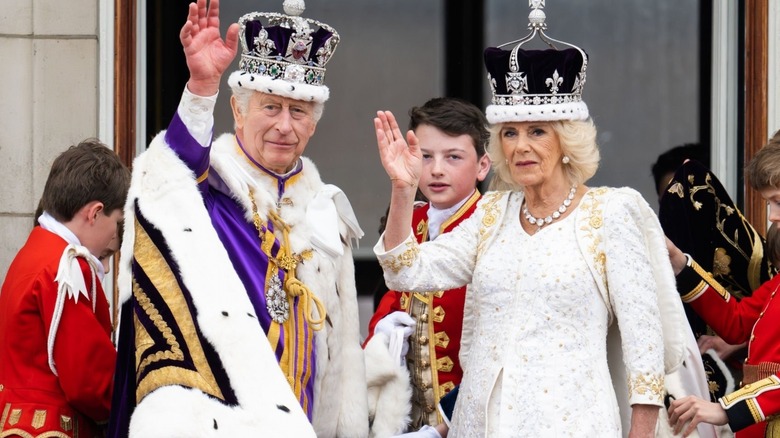 Charles and Camilla waving at coronation