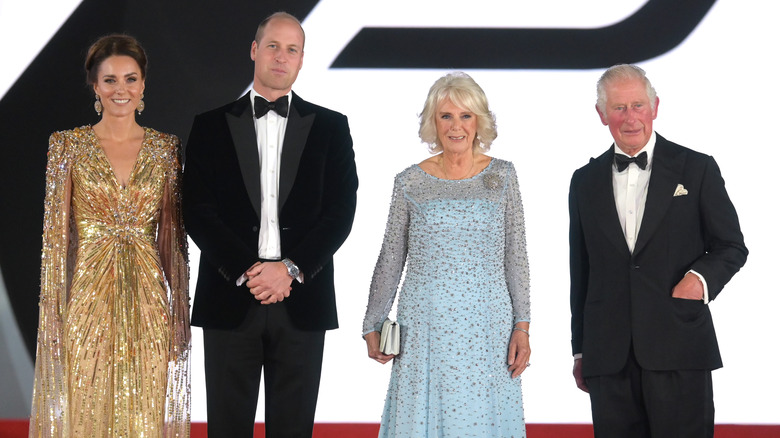 Kate Middleton, Prince William, Queen Camilla, and King Charles III posing