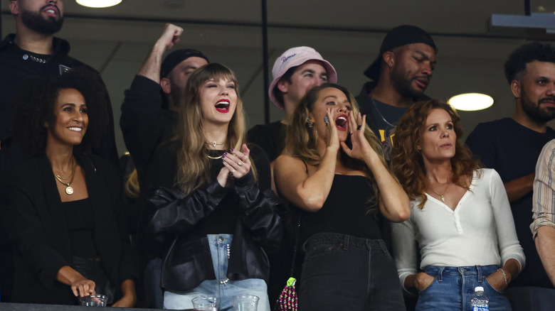 Taylor Swift and Blake Lively cheering at the Chiefs Jets game