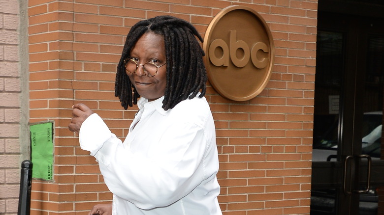 Whoopi Goldberg smiling at camera