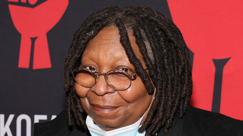 Whoopi Goldberg looking