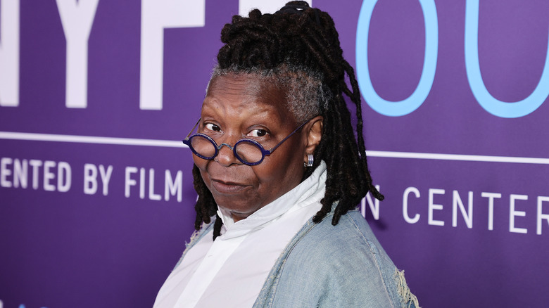 Whoopi goldberg raising eyebrows at film festival