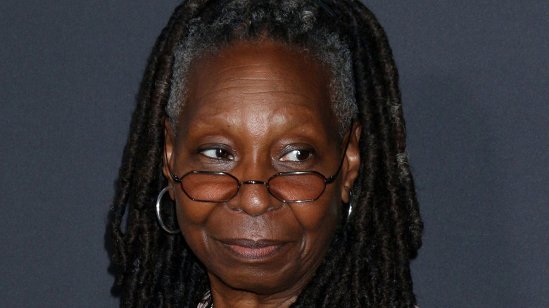 Whoopi Goldberg wearing glasses on the red carpet