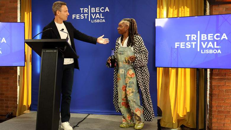 Whoopi Goldeberg (in overalls) and Tony Goldwyn at the Tribeca Film Festival