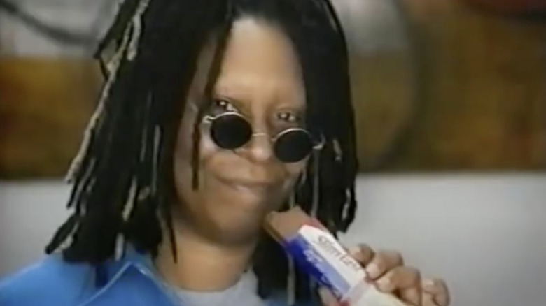 Whoopi Goldberg posing with SlimFast bar