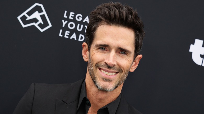 Brandon Beemer smiling on the red carpet (close-up)