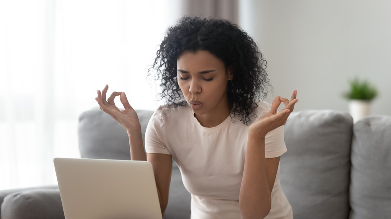 Woman breathing and calming down