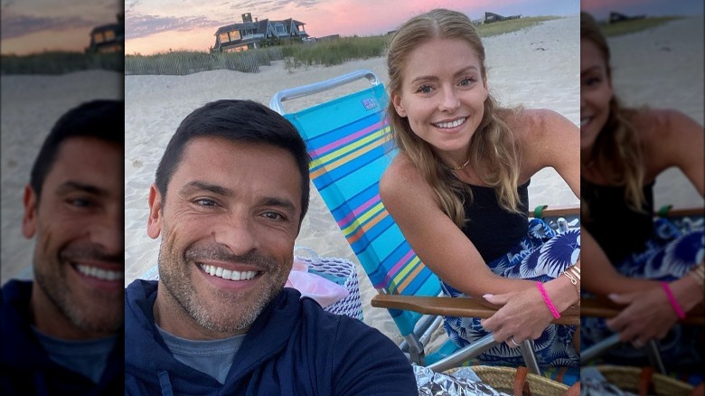 Kelly Ripa and Mark Consuelos on the beach