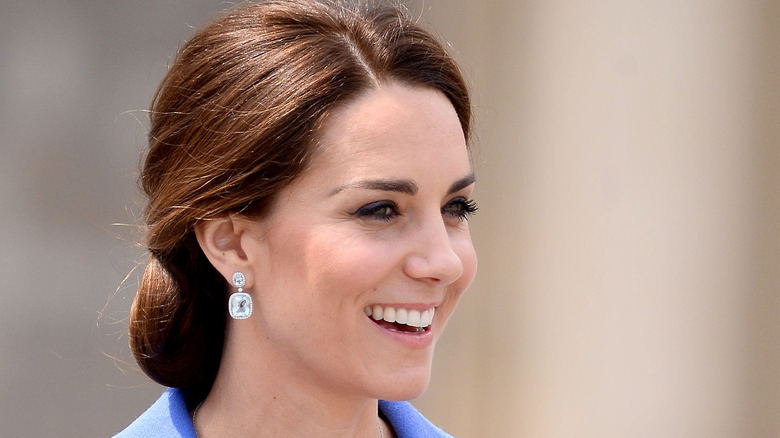 Kate Middleton smiling while visiting Germany