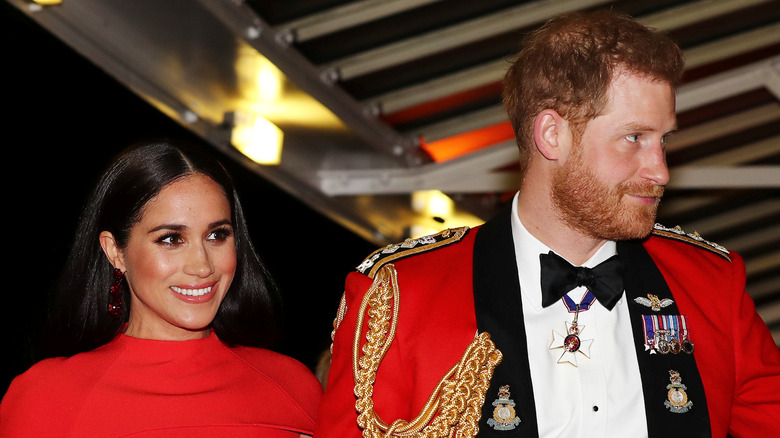 Meghan Markle and Prince Harry attend an event