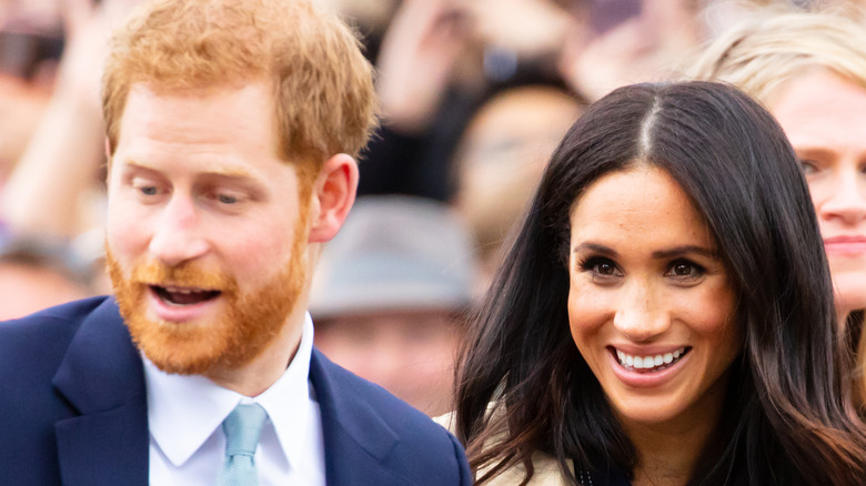 Prince Harry and Meghan Markle smiling 