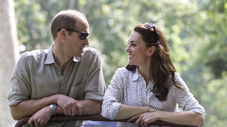 Prince William and Kate Middleton smiling at each other