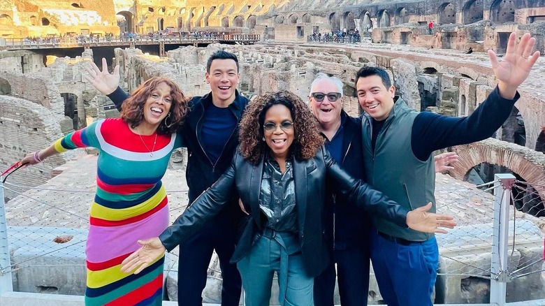 Oprah Winfrey, Gayle King, and friends smiling in Italy