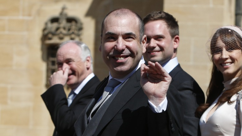 Rick Hoffman smiling, waving