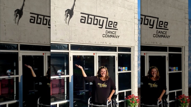 Abby Lee Miller standing in front of ALDC studio in Pittsburgh