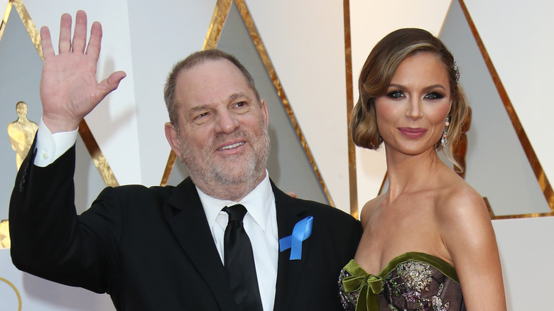 Harvey Weinstein and Georgina Chapman posing for photos