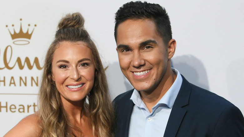 Alexa and Carlos PenaVega posing on the red carpet together