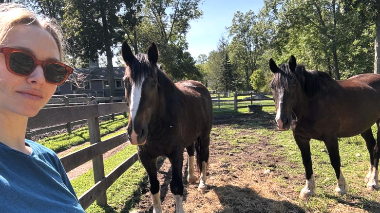 Amanda Seyfried with her horses